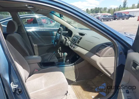 2003 Toyota Camry Le z USA, uszkodzony, nr VIN JTDBE32K130182354